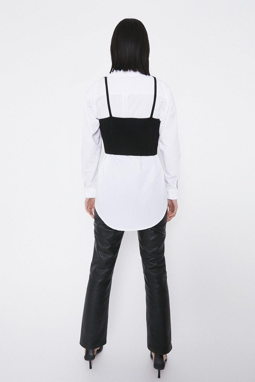 knitted vest over shirt