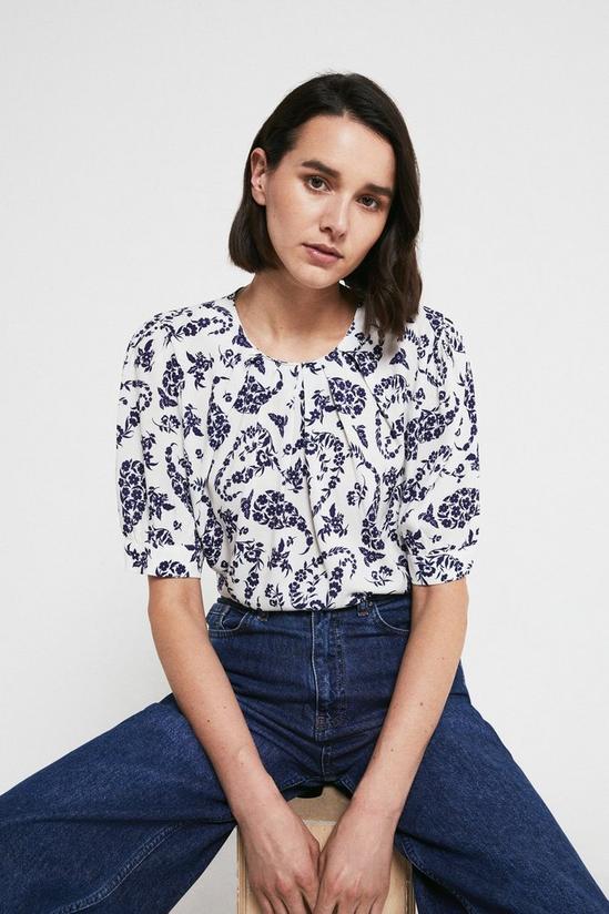 Warehouse Pleat Neck Top In Print With Short Sleeve 1