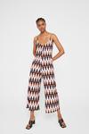 Warehouse Printed Strappy Cross Back Jumpsuit thumbnail 1