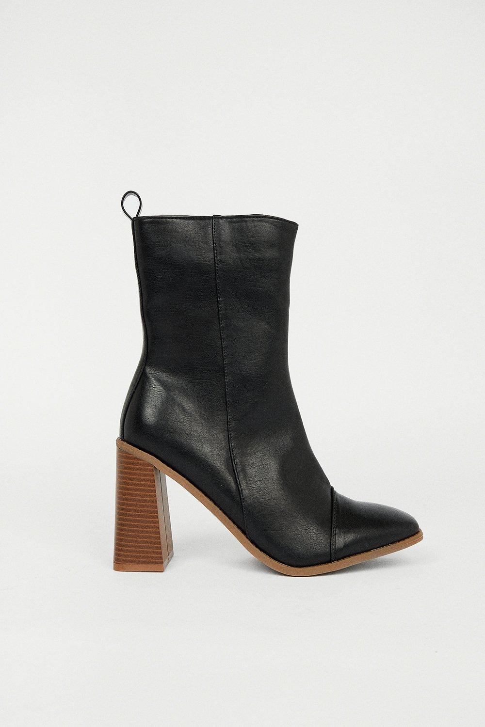 Boots with 2025 wooden heel