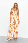 Warehouse Petite Abstract Print Satin Cowl Strappy Jumpsuit thumbnail 1